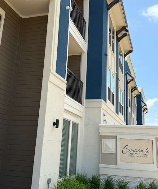 A building with a sign that says "Campanile" on it.