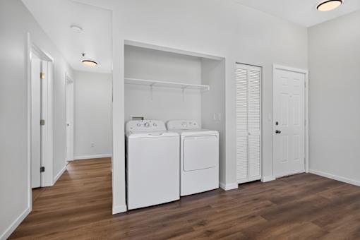 A laundry room with a washer and dryer.