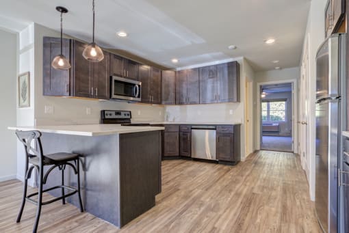Renovated Kitchen and dining at Nu-Horizons, Copiague, NY, 11726