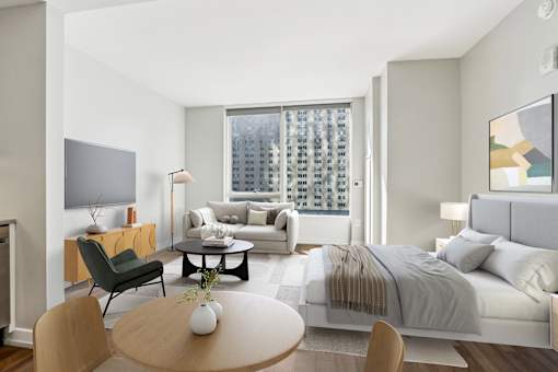 A modern bedroom with a large bed and a television.