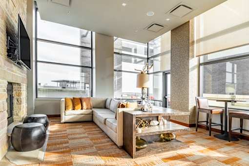 A living room with a fireplace and a couch.