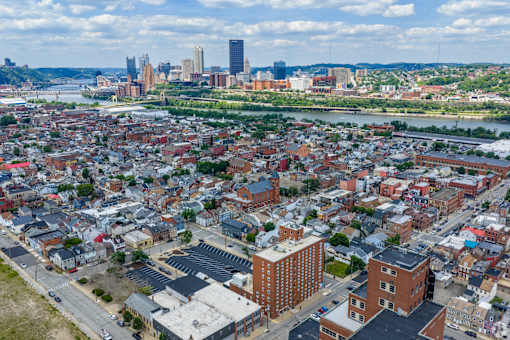 A cityscape with a mix of residential and commercial buildings.at The Jones Tower at the Collective, Pittsburgh, PA 15203