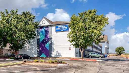 an office building with a mural on the side of it