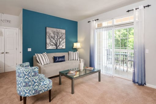 Living Room with Blue Accent Wall at 62Eleven, Elkridge, MD, 21075