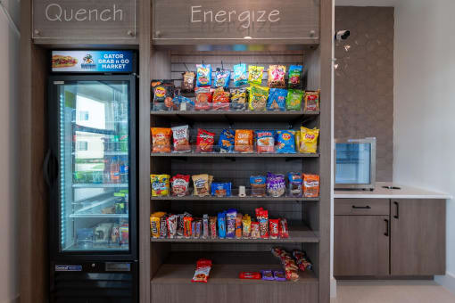 Vending Machine with Snacks in a Pantry at AVILA Apartments, Oviedo