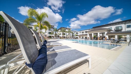Swimming Pool Lounge at AVILA Apartments, Oviedo Florida