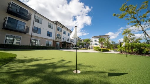 Outdoor Games Area at AVILA Apartments, Oviedo, 32765