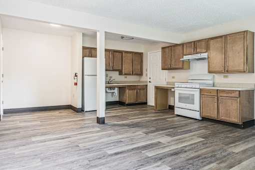 A Kitchen With Wooden Floors at Hilldale Apartments, Memphis