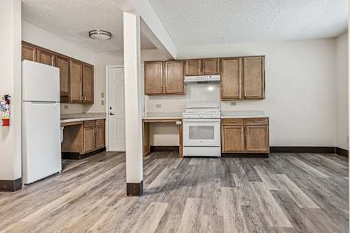 A Kitchen With White Appliances at Hilldale Apartments, Memphis, 38128