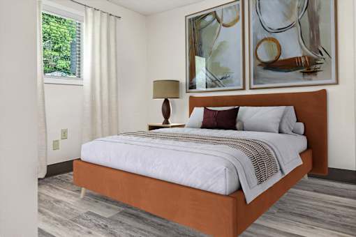 A Bedroom With Two Paintings at Hilldale Apartments, Memphis