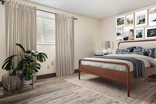 A Bedroom With Potted Plant at Hilldale Apartments, Memphis, TN, 38128