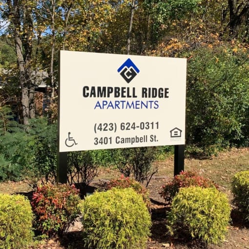 A sign that reads Campbell Ridge Apartments
