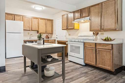 A Kitchen With a White Fridge at Hilldale Apartments, Memphis, 38128