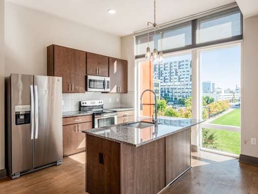 Kitchen with a Refrigerator at 303 Front St Apartments, Ohio