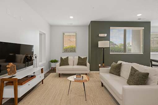 a living room with two white couches and a coffee table at DeSales Flats Apartments*, Cincinnati, 45206