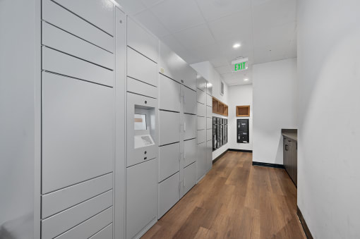 a long white storage room with white cabinets and a wood floor at Four23/Hoge, Cincinnati, OH, 45226