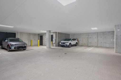 two cars parked in a parking garage at Four23/Hoge, Ohio