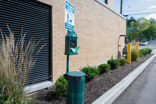 a parking meter on the side of a building at Four23/Hoge, Ohio, 45226