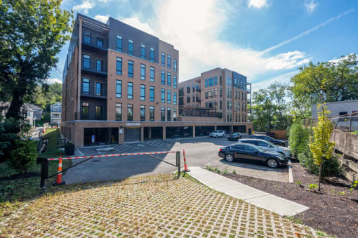 a parking lot in front of a building with a car parked at Four23/Hoge, Ohio