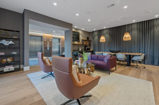 a living room with couches and chairs and a table at Four23/Hoge, Ohio