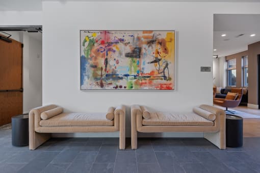 a living room with two couches and a painting on the wall at Four23/Hoge, Cincinnati, 45226