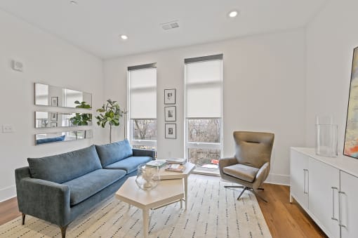 Living room with white walls and hardwood floors at Four23/Hoge, Ohio, 45226