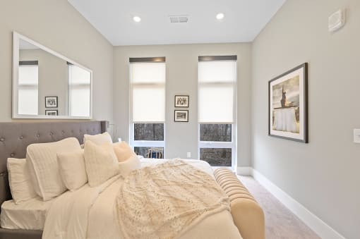 Bedroom with grey walls and a large bed at Four23/Hoge, Cincinnati, OH, 45226