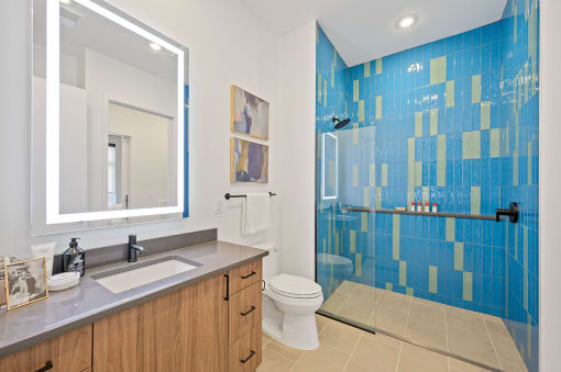Bathroom with white walls and blue tiles at Four23/Hoge, Ohio, 45226