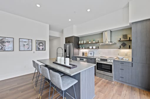 Kitchen with a large center island with a breakfast bar at Four23/Hoge, Cincinnati, 45226