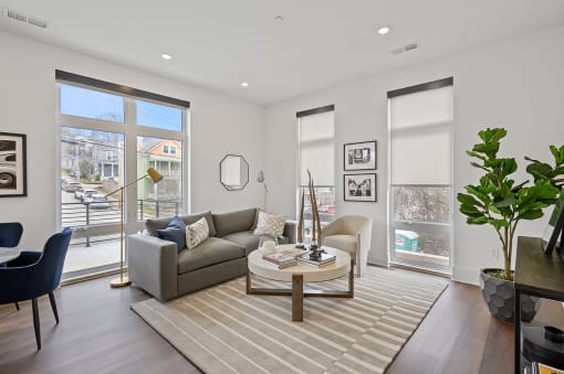 Living room with white walls and hardwood floors at Four23/Hoge, Cincinnati, 45226