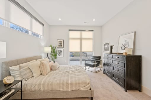 Bedroom with a bed and a dresser at Four23/Hoge, Cincinnati, OH, 45226