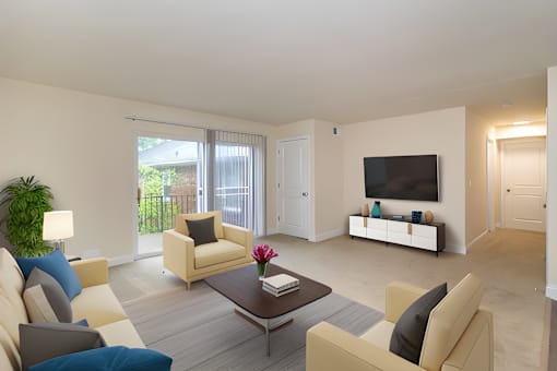 a living room with couches and a coffee table and a television at Olde Towne in Kenwood, Cincinnati, Ohio