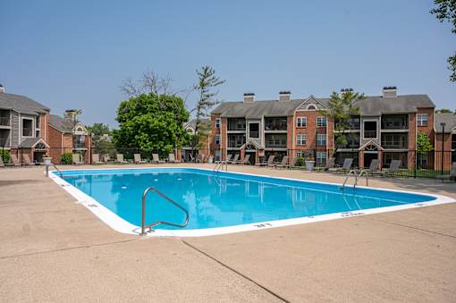 Swimming pool with an apartment building in the background at Indian Lookout, 45449