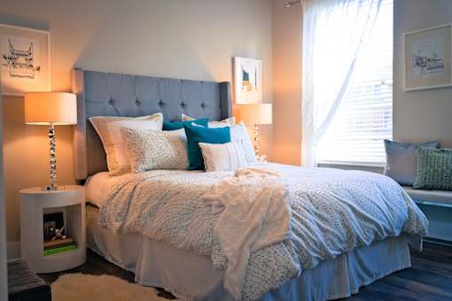 a bedroom with a bed and a window at DeSales Flats Apartments*, Ohio, 45206