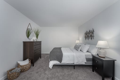 White interior bedroom with bed at SoDel, Kettering, OH, 45429