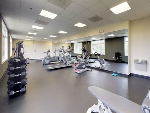 Modern gym with equipment at Woodlee Terrace Apartments, Woodbridge