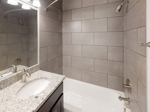 Modern interior view of bathroom in apartment unit at Woodlee Terrace Apartments, Woodbridge, VA, 22192