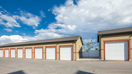 A row of garage doors are closed.