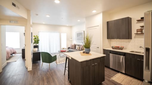an open floor plan with a kitchen and living room