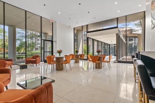 a room with a table and chairs in it