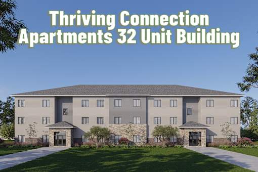 A large building with the words "Thriving Connection Apartments 32 Unit Building" written above it.