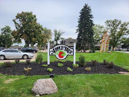 The exterior signage for Appletree Apartments, showcasing the community name in bold letters.