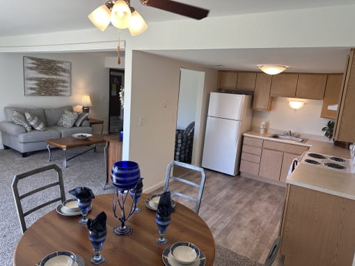 Open-concept living space in a Park 25 Apartments model unit, featuring a seamless flow between areas for a connected and spacious feel.