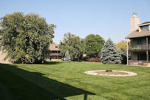 A wide view of the Eden West Apartments Complex, showcasing the buildings and surrounding landscape.