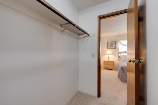 Closet space in the one-bedroom model unit at Olde English Village, providing ample storage for residents.