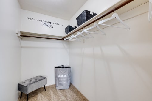 Closet space in the two-bedroom model unit at Olde English Village, providing ample storage for residents.