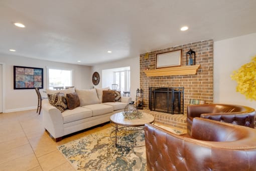 A classic living room in the clubhouse interior, featuring timeless furniture, comfortable seating arrangements, and tasteful decor, provides a welcoming and cozy communal space for residents to relax and socialize.