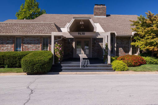 A sunny day view of the apartment buildings at Regent’s Walk Apartment Homes.