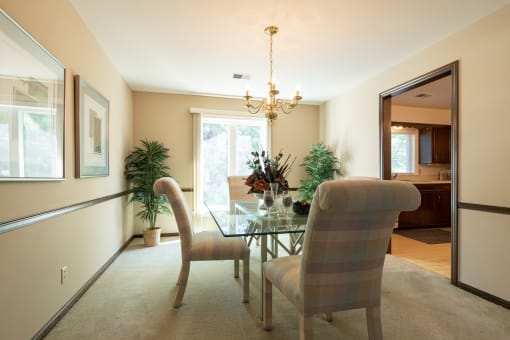 A cozy dining area in a two-bedroom apartment at Regent’s Walk Apartment Homes, featuring space for a dining table.