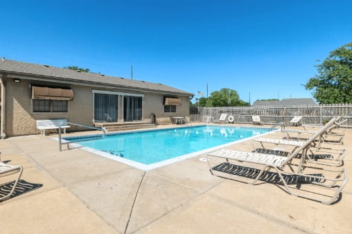 Swimming pool in front of the Southfork Apartments clubhouse.